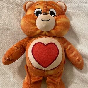 Care Bears Orange Denim edition featuring the Tender heart Bear.